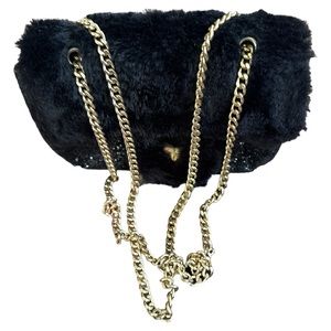 Childrens Place black glitter and fur purse